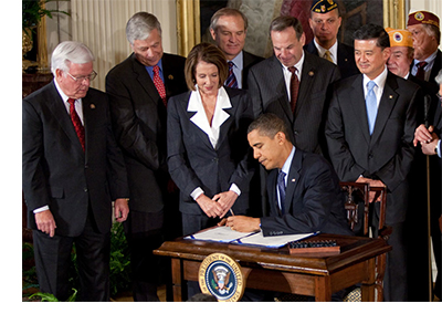 President Obama signs Health Reform into Law